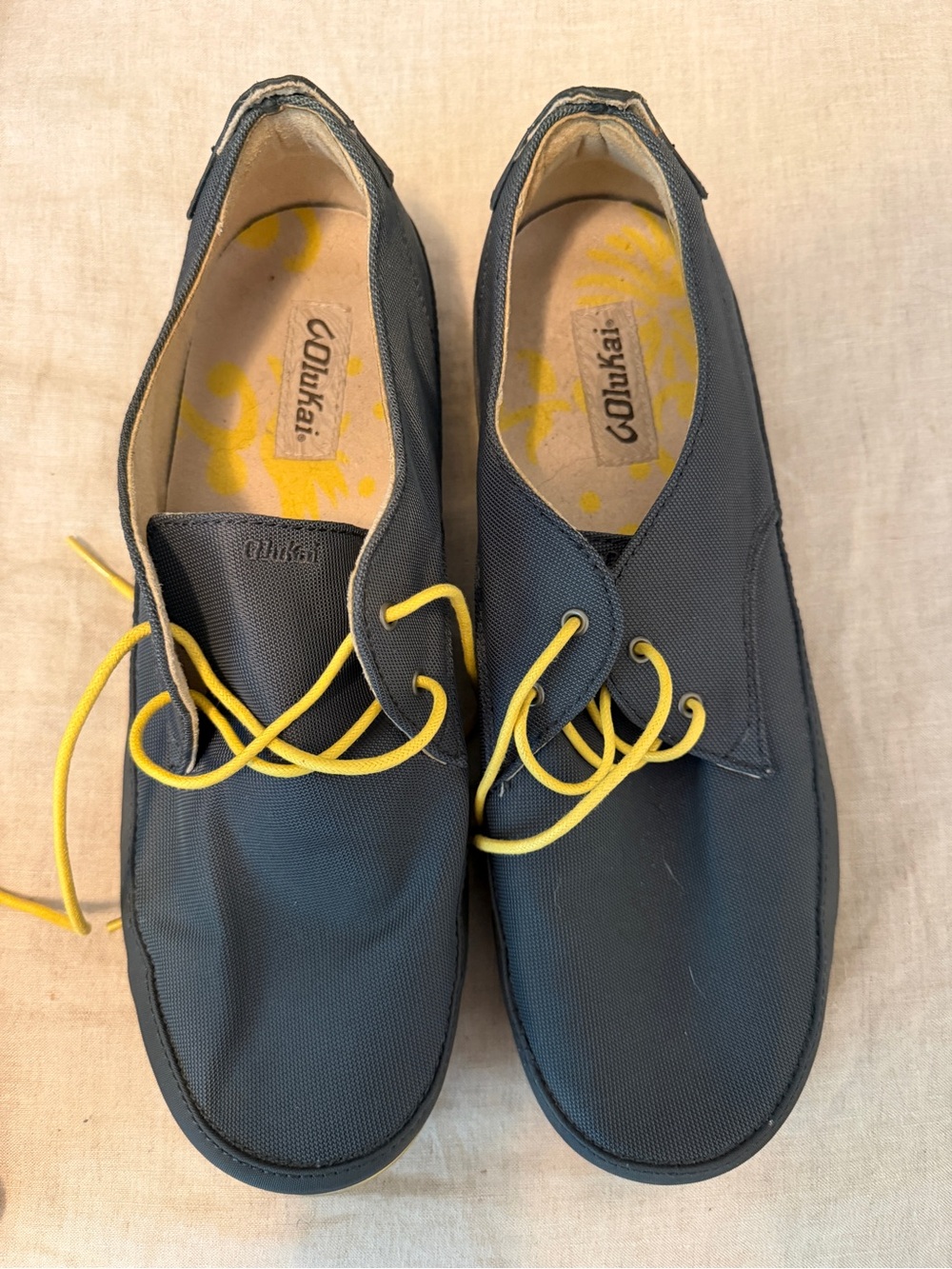 OluKai Men's Navy Canvas Boat Shoes with Yellow Laces